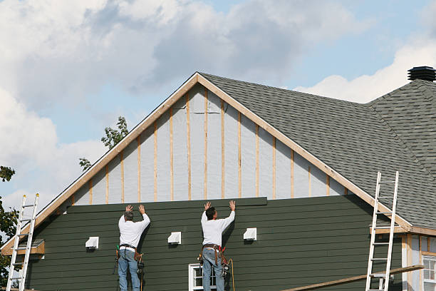 Professional Storm Damage Siding Repair technician working in Upperstrasburg, PA